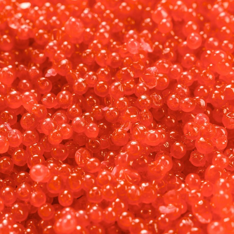 A close-up shot of bright red Habanero Capelin Roe