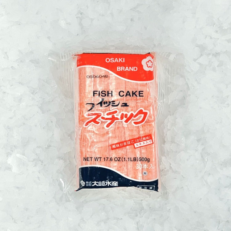 Front of Osaki Brand Fish Cake packaging featuring 30 fish cake sticks. Net weight 17.6 oz (500g), product of Japan, perfect for adding to soups and stir-fries.