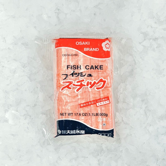 Front of Osaki Brand Fish Cake packaging featuring 30 fish cake sticks. Net weight 17.6 oz (500g), product of Japan, perfect for adding to soups and stir-fries.