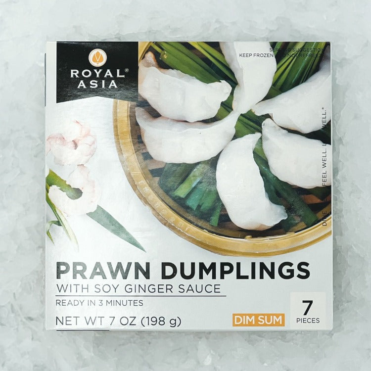 Front view of Royal Asia prawn dumplings with soy ginger sauce packaging, featuring the dumplings in a bamboo steamer