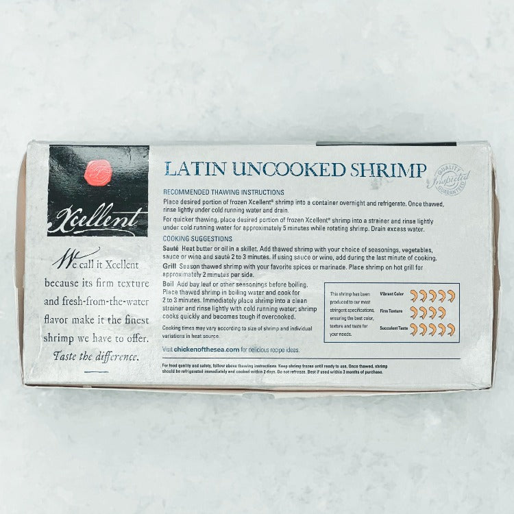 Back view of Xcellent Latin Uncooked Shrimp packaging with cooking instructions and nutritional information